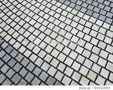 Concrete pavers of various colors are arranged according to the design and pattern of the material. This material is suitable for use as a floor for footpaths and vehicles. Concrete pavers of various colors are arranged according to the design and pattern of the material. This material is suitable for use as a floor for footpaths and vehicles. 94442693