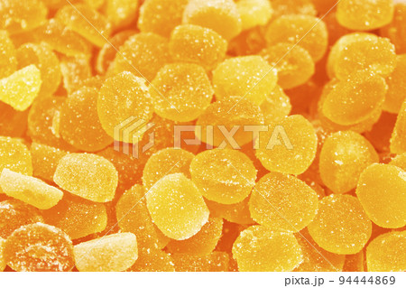 Background of orange jelly beans. Sweet food. Unhealthy concept 94444869