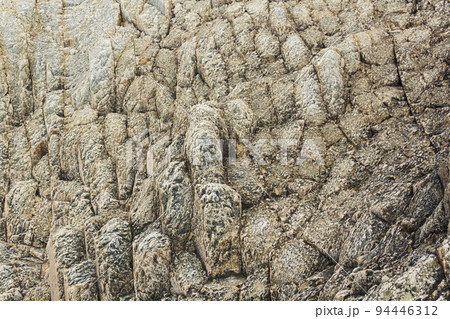 natural background, rock texture from weathered columnar basalt natural background, rock texture from weathered columnar basalt 94446312