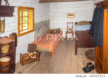 traditional historical bedroom interior in a timbered cottage from the 19th century in central europe 94447011