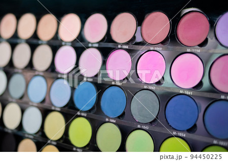 Pallet with vibrant eyeshadow for make up in cosmetic store Pallet with vibrant eyeshadow for make up in cosmetic store 94450225