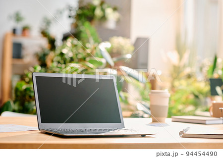 Black screen of laptop standing on workplace of chief executive officer 94454490