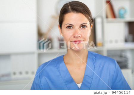Closeup portrait of smiling female health worker in office Closeup portrait of smiling female health worker in office 94456114