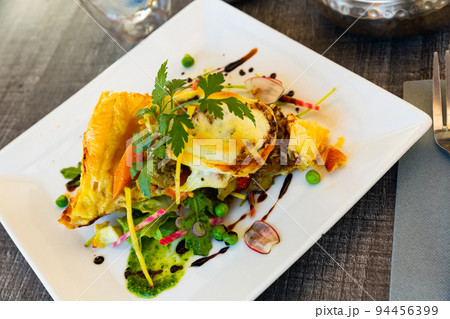 Tarte with vegetables and buffalo mozzarella Tarte with vegetables and buffalo mozzarella 94456399