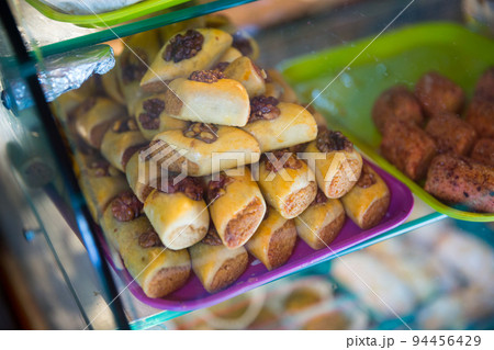Counter with many oriental sweets Counter with many oriental sweets 94456429