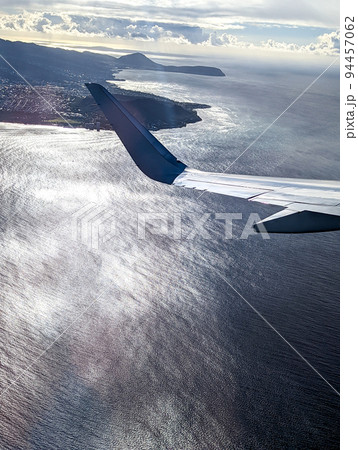 Jet Airplane Flying Over Oahu Island Hawaii Pacific Ocean 94457062