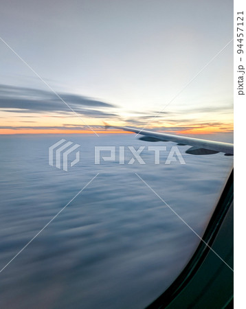 early morning sunrise from an airplane early morning sunrise from an airplane 94457121