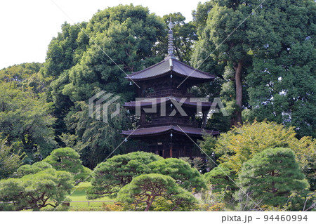 The three tiered pagoda in the garden of the famous and historical Chinzanso Hotel in Tokyo, Japan. Originally in Hiroshima Chikurinji temple, the pagoda is now called Entsukaku. 94460994