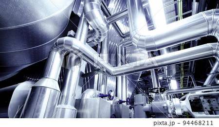 Equipment, cables and piping as found inside of a modern industrial power plant 94468211