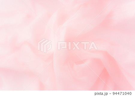 ふわふわピンクの布の背景素材 94471040