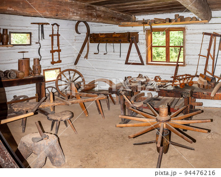 traditional historical carpentry workshop interior in a timbered cottage from the 19th century in central europe traditional historical carpentry workshop interior in a timbered cottage from the 19th century in central europe 94476216