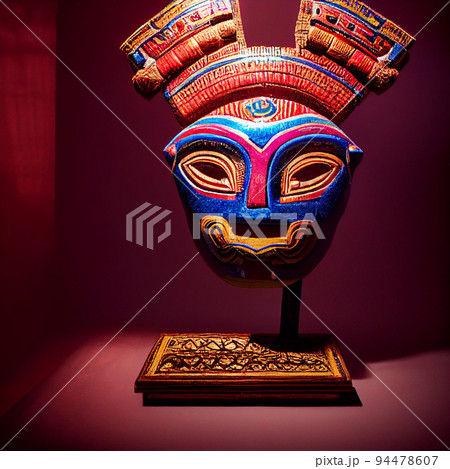 Peruvian Mayan Mask on stand in studio. Multi color. Ancient art. Studio Backdrop. Filmic lighting. Front light. Top light. Directional lighting. Peruvian Mayan Mask on stand in studio. Multi color. Ancient art. Studio Backdrop. Filmic lighting. Front light. Top light. Directional lighting. 94478607
