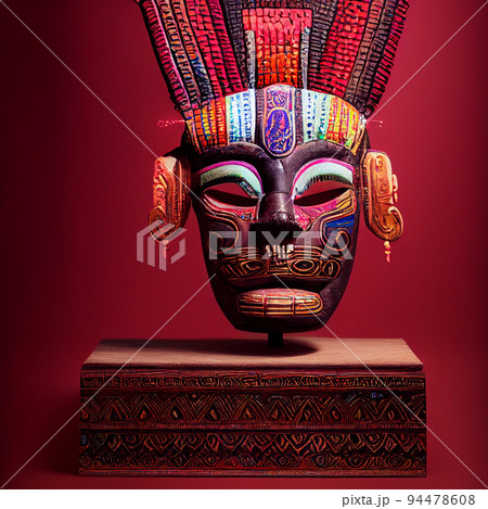 Peruvian Mayan Mask on stand in studio. Multi color. Ancient art. Studio Backdrop. Filmic lighting. Front light. Top light. Directional lighting. 94478608