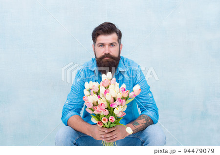 celebrates holiday on March 8. happy fathers day concept. Womens day present. Fresh colorful tulips. gift with love. Easter and surprise concept. International Womans Day. Happy Birthday greeting 94479079