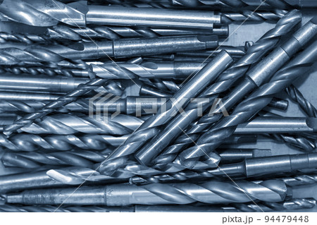 Close-up scene the group of used hole tools for CNC milling machine. Close-up scene the group of used hole tools for CNC milling machine. 94479448