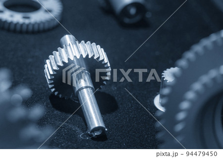 Close-up scene of metal pinion gear spare parts. Close-up scene of metal pinion gear spare parts. 94479450