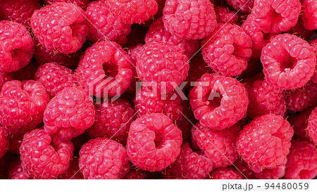 Raspberry. Fresh organic berries with leaves macro. Fruit background. 94480059