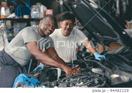 happy auto mechanics service team staff worker enjoy working together portrait happy smiling happy auto mechanics service team staff worker enjoy working together portrait happy smiling 94482129
