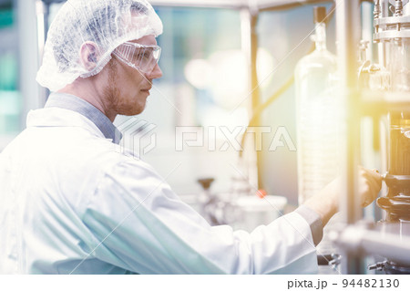 medicine factory scientist worker with Cannabis CBD oil extraction machine. Hemp oil extraction Thin Film Distillation Laboratory Plants Process. medicine factory scientist worker with Cannabis CBD oil extraction machine. Hemp oil extraction Thin Film Distillation Laboratory Plants Process. 94482130
