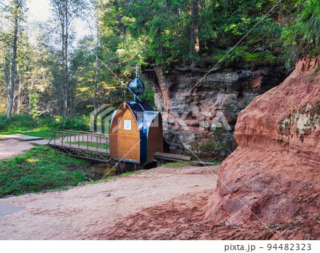 A healing spring, a bathhouse and a Chapel in the name of the Icon of the Mother of God in Rozhdestveno. Russia. 94482323