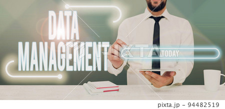 Conceptual caption Data ManagementThe practice of organizing and maintaining data processes. Conceptual photo The practice of organizing and maintaining data processes 94482519