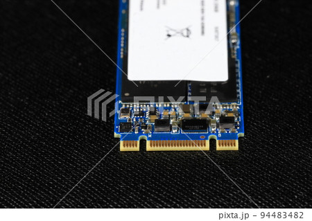 Solid state drives for computer - ssd sata, NVME PCIe, SATA SSD m key, b key isolated on dark background Solid state drives for computer - ssd sata, NVME PCIe, SATA SSD m key, b key isolated on dark background 94483482
