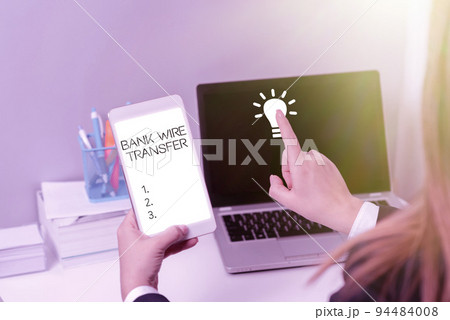 Text caption presenting Bank Wire TransferElectronic transfer of money through banks. Concept meaning Electronic transition of funds through financial instances. Text caption presenting Bank Wire TransferElectronic transfer of money through banks. Concept meaning Electronic transition of funds through financial instances. 94484008