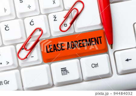Handwriting text Lease AgreementContract on the terms to one party agrees rent property. Word Written on Contract on the terms to one party agrees rent property Handwriting text Lease AgreementContract on the terms to one party agrees rent property. Word Written on Contract on the terms to one party agrees rent property 94484032