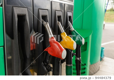 Colorfull fuel gasoline dispenser background. 94484379