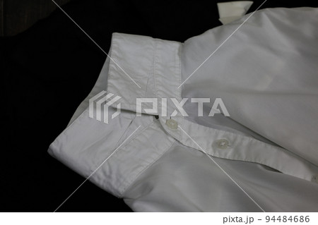 Classic tailcoat suit. White shirt, white bow tie and black jacket. Suit for ballroom dancing. Wedding accessories 94484686