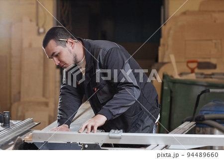 Young Worker At Factory Side View 94489660