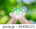Hand holding with environment icons 94490121