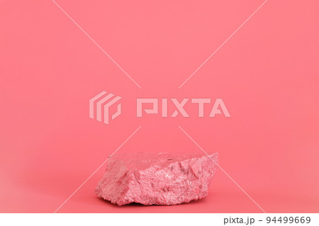 Pink stone, rock podium on the pink background. Podium for product, cosmetic presentation. Creative mock up. Pedestal or platform for beauty products. Pink stone, rock podium on the pink background. Podium for product, cosmetic presentation. Creative mock up. Pedestal or platform for beauty products. 94499669