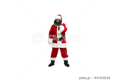 Portrait of senior man in image of Santa Claus looking in tube isolated over white background 94503636