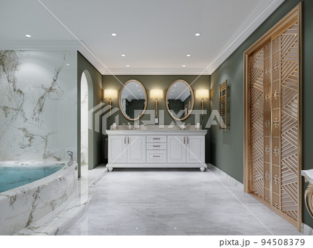 Bathroom with green walls and white double washbasin with two oval mirrors. 94508379