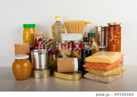 Emergency survival food set on white kitchen table 94509369