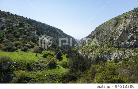 Water meadows and hills on the Mediterranean coast on the island of Cyprus. 94513286
