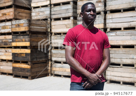 Portrait of afro man worker in warehouse Portrait of afro man worker in warehouse 94517677