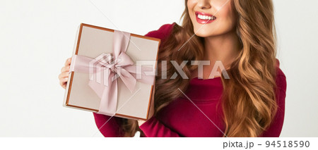 Birthday, Christmas or holiday present, happy woman holding a green gift or luxury beauty box subscription delivery isolated on white background, portrait 94518590
