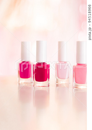 Shades of pink and red nail polish set on glamour background, nailpolish bottles for manicure and pedicure, luxury beauty cosmetics and make-up brand ad 94518966