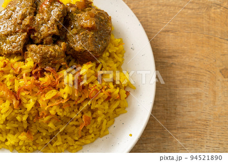 Beef Biryani or Curried rice and beef - Thai-Muslim version of Indian biryani, with fragrant yellow rice and beef 94521890