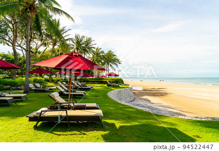 Umbrella and chair  with sea ocean view in hotel resort 94522447