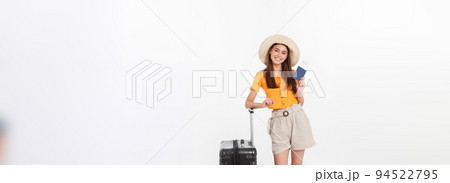 Full length of attractive young female in traveller casual with the travel bag, isolated on white background Full length of attractive young female in traveller casual with the travel bag, isolated on white background 94522795
