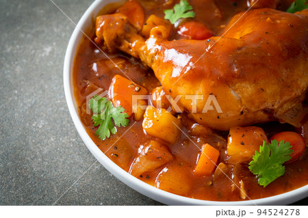 chicken stew with tomatoes, onions, carrot and potatoes 94524278