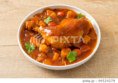 chicken stew with tomatoes, onions, carrot and potatoes 94524279
