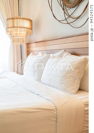 white pillow decoration on bed in bedroom white pillow decoration on bed in bedroom 94524575