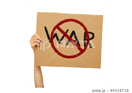 Poster against the war made of cardboard in hand. International day of Peace. Isolated on a white background Poster against the war made of cardboard in hand. International day of Peace. Isolated on a white background 94528718