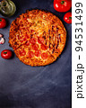 Pizza with different toppings - pepperoni, cheese, margarita, barbecue 94531499