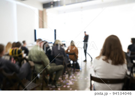 Blurred background of the business conference, one man on the stage, presentation of the project, public talk. High quality photo Blurred background of the business conference, one man on the stage, presentation of the project, public talk. High quality photo 94534046