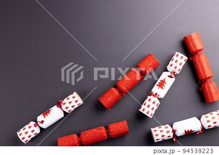Image of christmas crackers with copy space on grey background 94539223